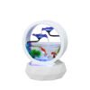 fish tank water feature with blue lotus